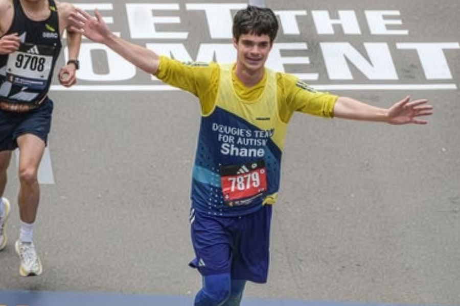Student, Shane Johnson completing the Boston Marathon. 